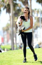 NINA DOBREV with Her Puppy at a Local Park in Los Angeles 07/05/2017