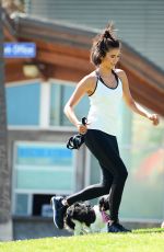 NINA DOBREV with Her Puppy at a Local Park in Los Angeles 07/05/2017