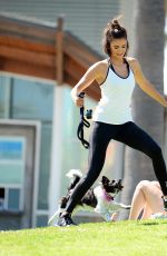 NINA DOBREV with Her Puppy at a Local Park in Los Angeles 07/05/2017