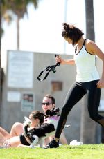 NINA DOBREV with Her Puppy at a Local Park in Los Angeles 07/05/2017