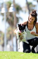 NINA DOBREV with Her Puppy at a Local Park in Los Angeles 07/05/2017