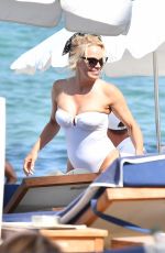PAMELA ANDERSON in Swimsuit at a Beach in St Tropez 07/18/2017