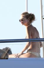 TAYLOR HILL and DAPHNE GROENEVELD in Bikinis at a Yacht in St. Tropez 07/24/2017