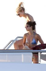 TAYLOR HILL and DAPHNE GROENEVELD in Bikinis at a Yacht in St. Tropez 07/24/2017