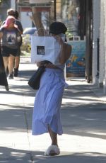 VANESSA HUDGENS Hides Behind a Bag of Baguettes in Studio City 07/03/2017