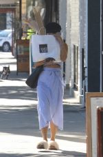 VANESSA HUDGENS Hides Behind a Bag of Baguettes in Studio City 07/03/2017