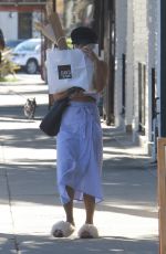 VANESSA HUDGENS Hides Behind a Bag of Baguettes in Studio City 07/03/2017