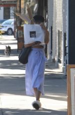 VANESSA HUDGENS Hides Behind a Bag of Baguettes in Studio City 07/03/2017