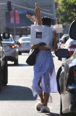 VANESSA HUDGENS Hides Behind a Bag of Baguettes in Studio City 07/03/2017
