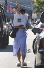 VANESSA HUDGENS Hides Behind a Bag of Baguettes in Studio City 07/03/2017