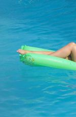 ABIGAIL CLARKE in Bikini at a Pool in Marbella 08/19/2017