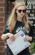 AMANDA SEYFRIED Out with Her Dog in Los Angeles 08/24/2017