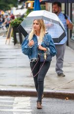 ASHLEY BENSON Out for a Walk in the Rain in New York 08/02/2017