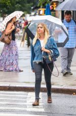 ASHLEY BENSON Out for a Walk in the Rain in New York 08/02/2017