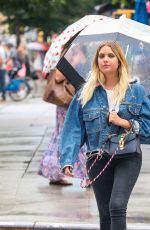ASHLEY BENSON Out for a Walk in the Rain in New York 08/02/2017