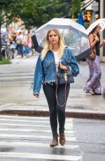 ASHLEY BENSON Out for a Walk in the Rain in New York 08/02/2017