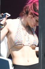 BELLA THORNE in Bikini Top Picks Up Her Delivery from Juice Crafters 08/05/2017