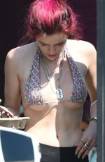 BELLA THORNE in Bikini Top Picks Up Her Delivery from Juice Crafters 08/05/2017