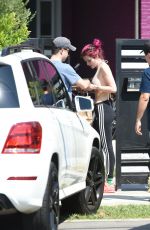 BELLA THORNE in Bikini Top Picks Up Her Delivery from Juice Crafters 08/05/2017