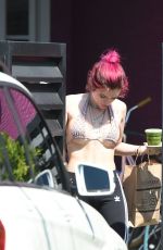 BELLA THORNE in Bikini Top Picks Up Her Delivery from Juice Crafters 08/05/2017