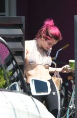 BELLA THORNE in Bikini Top Picks Up Her Delivery from Juice Crafters 08/05/2017