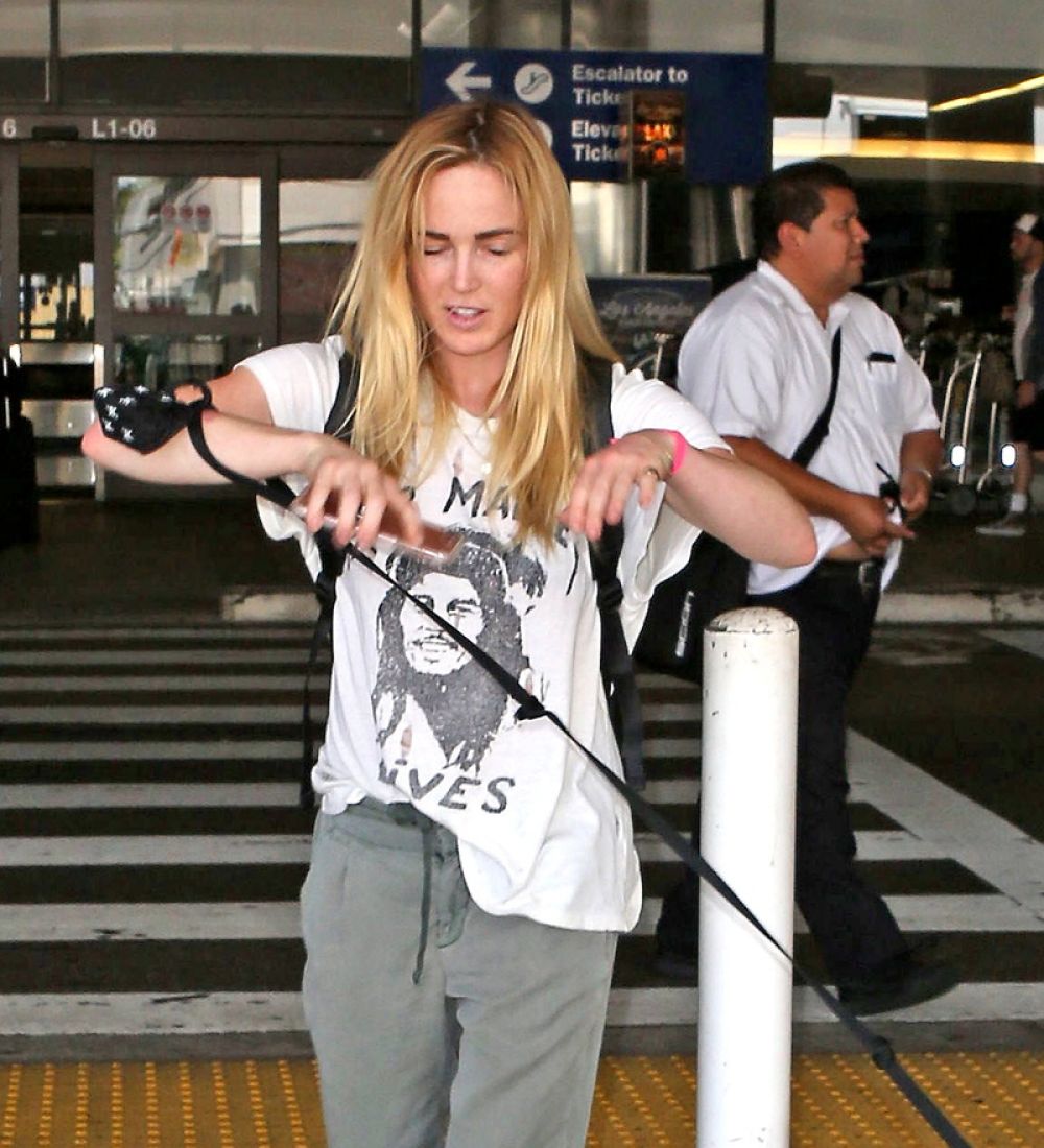 CAITY LOTZ with Her Dog at LAX Airport in Los Angeles 08/01/2017