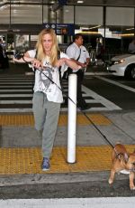 CAITY LOTZ with Her Dog at LAX Airport in Los Angeles 08/01/2017