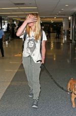 CAITY LOTZ with Her Dog at LAX Airport in Los Angeles 08/01/2017