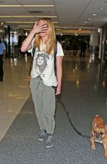 CAITY LOTZ with Her Dog at LAX Airport in Los Angeles 08/01/2017