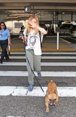 CAITY LOTZ with Her Dog at LAX Airport in Los Angeles 08/01/2017