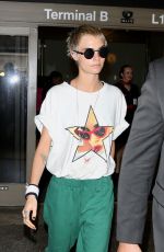 CARA DELEVINGNE at LAX Airport in Los Angeles 08/28/2017