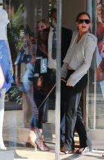 CRISSY TEIGEN Promotes Her New Clothing Line at Intermix in Los Angeles 08/11/2017