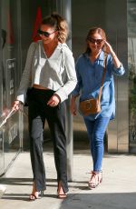 CRISSY TEIGEN Promotes Her New Clothing Line at Intermix in Los Angeles 08/11/2017