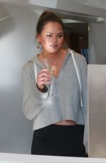 CRISSY TEIGEN Promotes Her New Clothing Line at Intermix in Los Angeles 08/11/2017