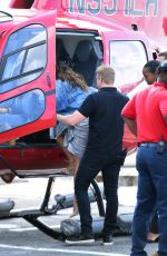 DEMI LOVATO Boarding an Helicopter in New York 08/19/2017