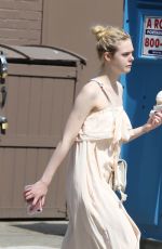 ELLE FANNING Out and About in New York 08/27/2017