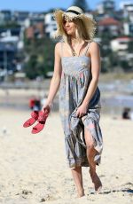 ELYSE KNOWLES on the Set of a Photoshoot for Ugg Shoes at Bondi Beach 08/28/2017