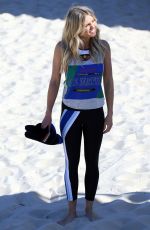 ELYSE KNOWLES on the Set of a Photoshoot for Ugg Shoes at Bondi Beach 08/28/2017