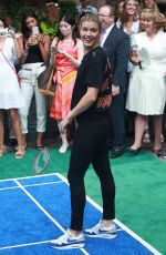 EUGENIE BOUCHARD Playing Badminton at Lotte New York Palace Tennis Invitational 08/24/2017