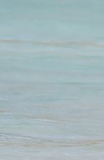HEIDI KLUM in Bikini at a Beach in Caribbean 08/08/2017