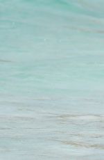 HEIDI KLUM in Bikini at a Beach in Caribbean 08/08/2017