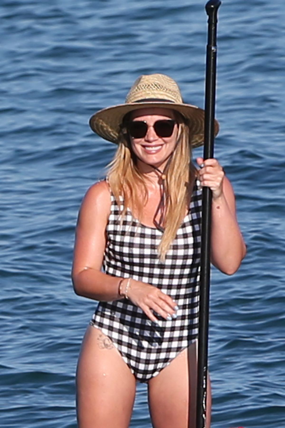 HILARY DUFF in Swimsuit at a Beach in Maui 08/02/2017 HILARY DUFF in Swimsuit at a Beach in Maui 08/02/2017