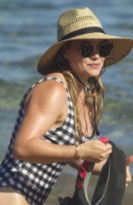 HILARY DUFF in Swimsuit at a Beach in Maui 08/02/2017