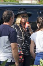 KATE MOSS Waiting for Her Driver at Airport in Ibiza 08/27/2017