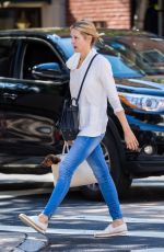 KELLY RUTHERFORD Out with Her Dog in New York 08/16/2017