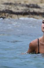 KIMBERLEY GARNER in Bikini at a Beach in St. Tropez 07/31/2017