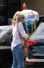 KIRSTEN DUNST Leaves a Party Store in Los Angeles 08/23/2017