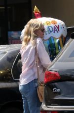 KIRSTEN DUNST Leaves a Party Store in Los Angeles 08/23/2017