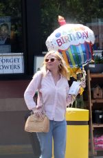 KIRSTEN DUNST Leaves a Party Store in Los Angeles 08/23/2017