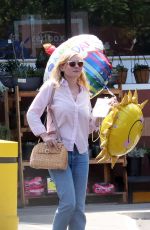 KIRSTEN DUNST Leaves a Party Store in Los Angeles 08/23/2017